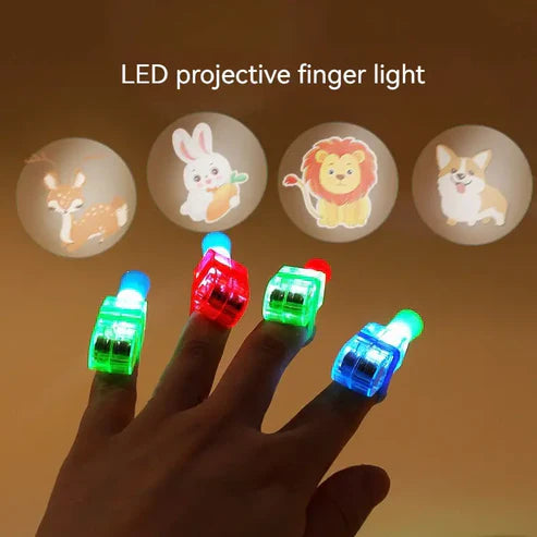 Set of four LED finger projector toys